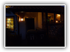 Night view of the outside of the cottage