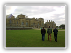 Gareth, Guy and Richard walking up to the entrance hall at the back of Holkham Hall